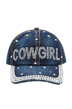 Denim cap with 'COWGIRL' text and pearl embellishments on a white background