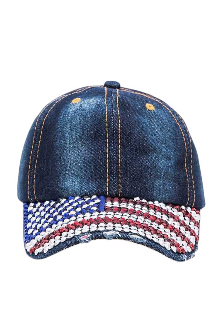 Blue denim cap with American flag design on a white background