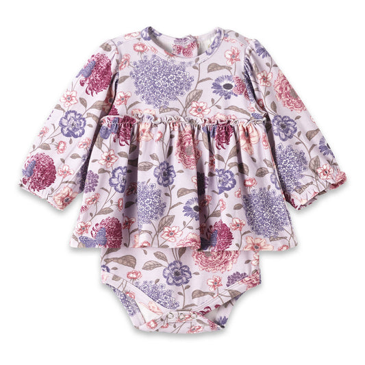 Floral baby dress and bloomers set on a white background
