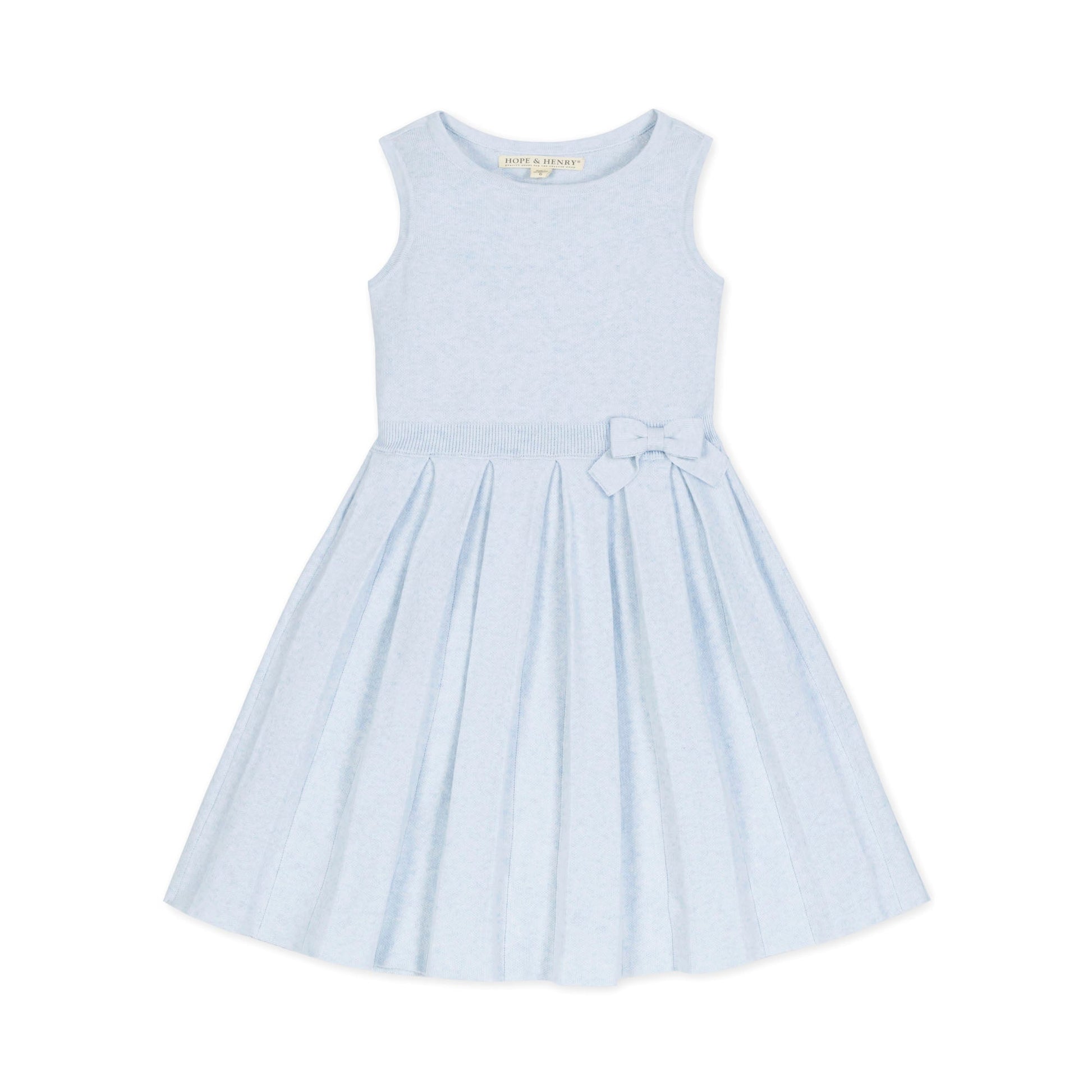 Light blue dress with a bow detail on a white background