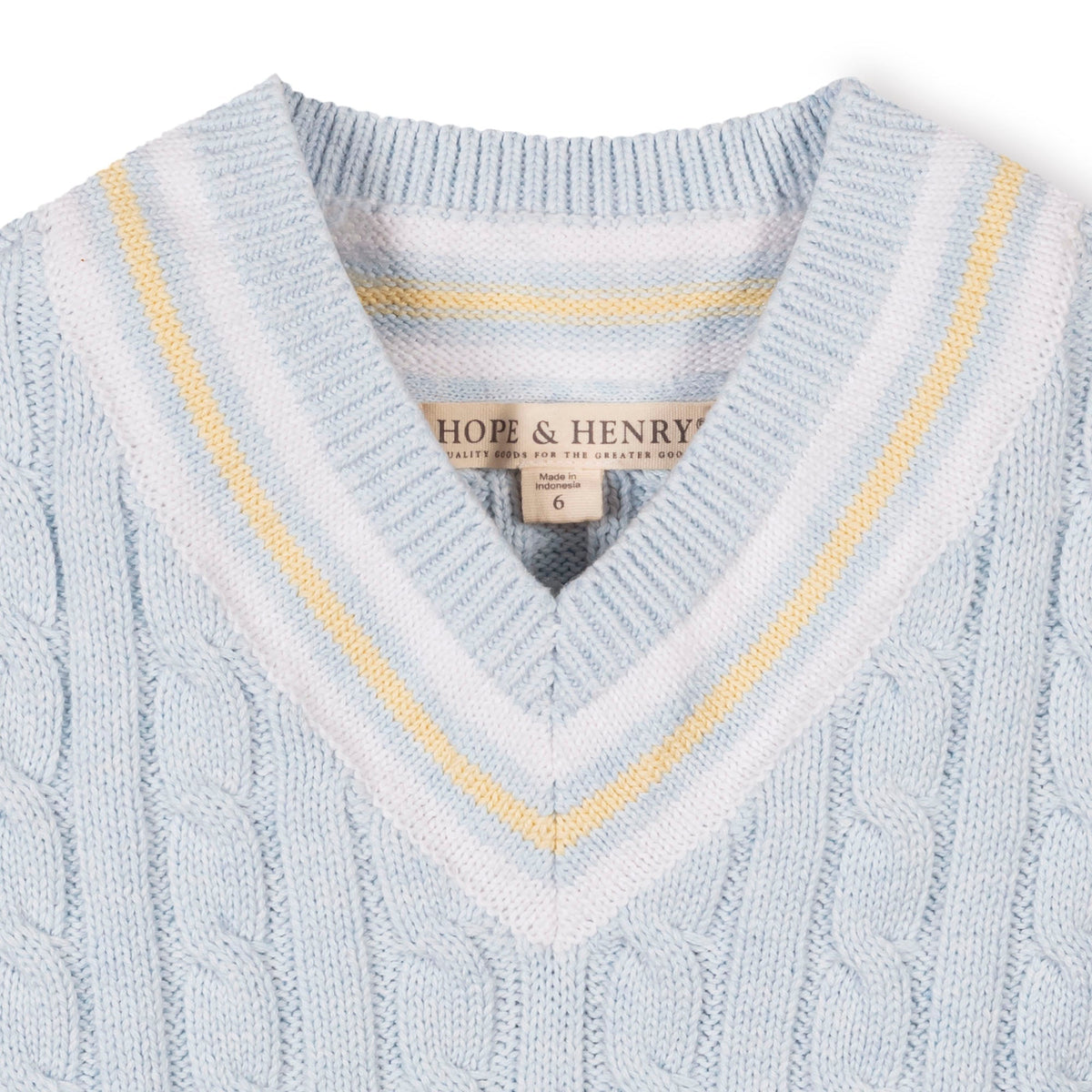 Light blue cable knit sweater with yellow trim and 'Hope & Henry' label.