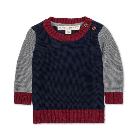 Children's sweater with red and gray sleeves and collar on a white background