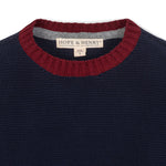 Navy sweater with red collar and Hope & Henry label on a white background
