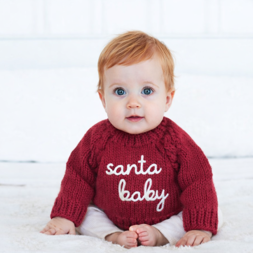 Huggalugs Santa Baby Sweater in Crimson, hand-knit baby Christmas sweater with Santa Baby stitched in natural yarn - view 2