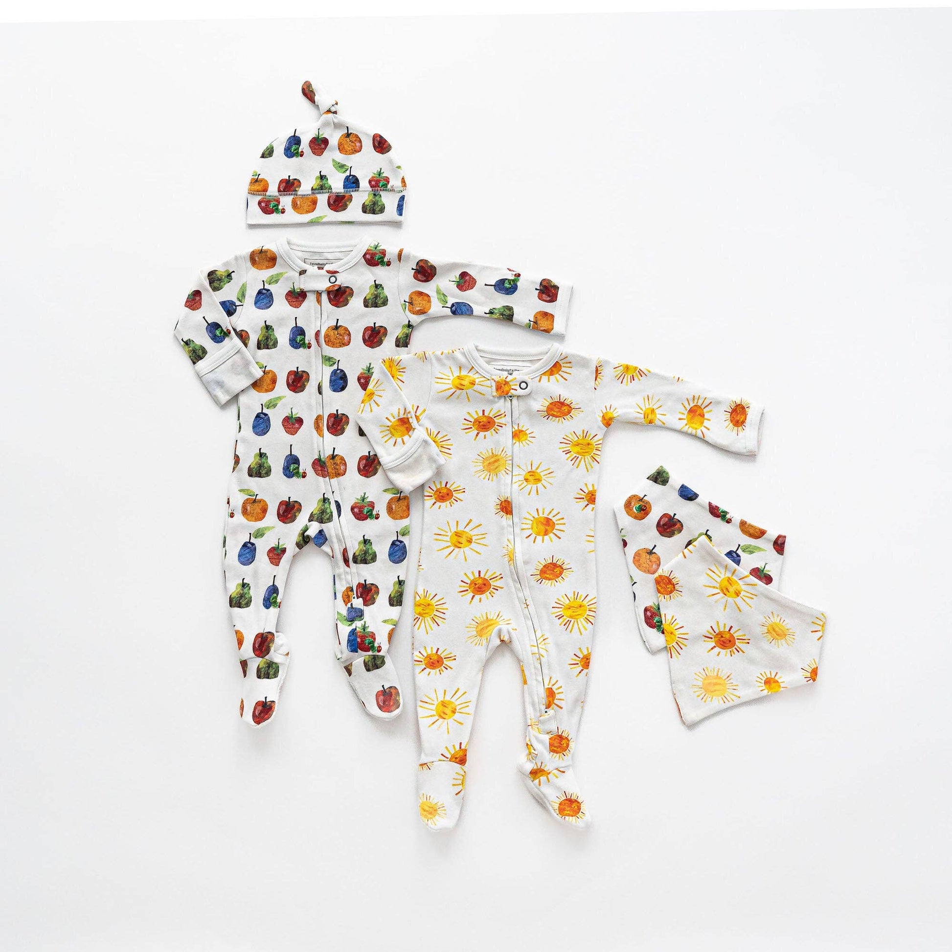 Baby clothing set with colorful patterns on a white background