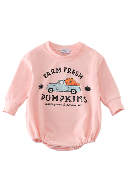 A long sleeve pink romper with 'Fresh Pumpkins' text and a graphic of a truck and pumpkins on it.