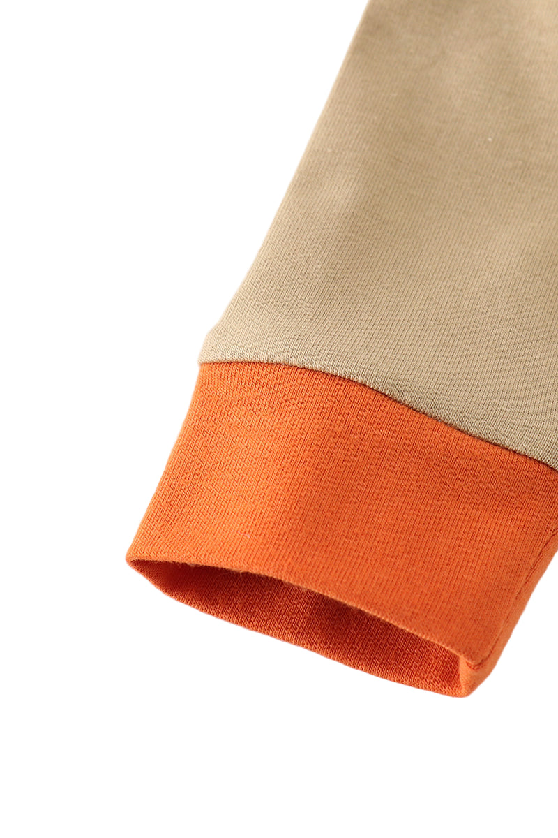 Close-up of a beige and orange sleeve on a white background