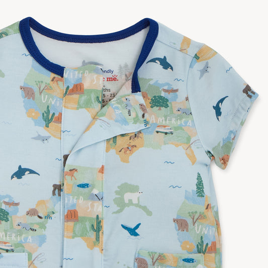 Baby romper front opening with America travel pattern on a white background