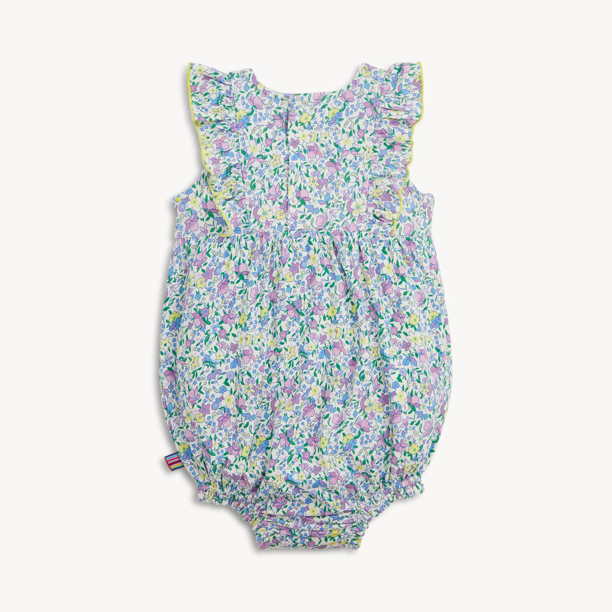 back of Floral baby romper on a white background
