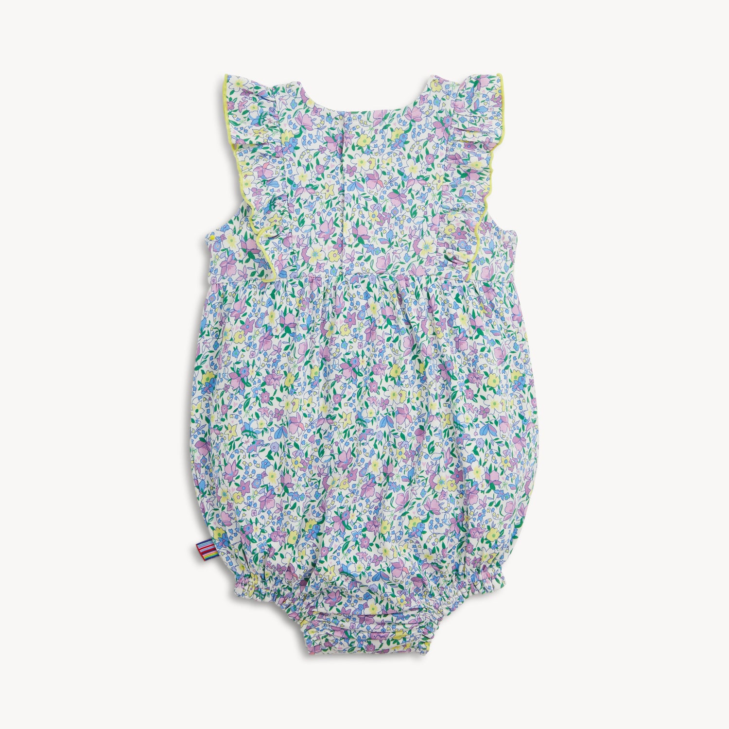 back of Floral baby romper on a white background