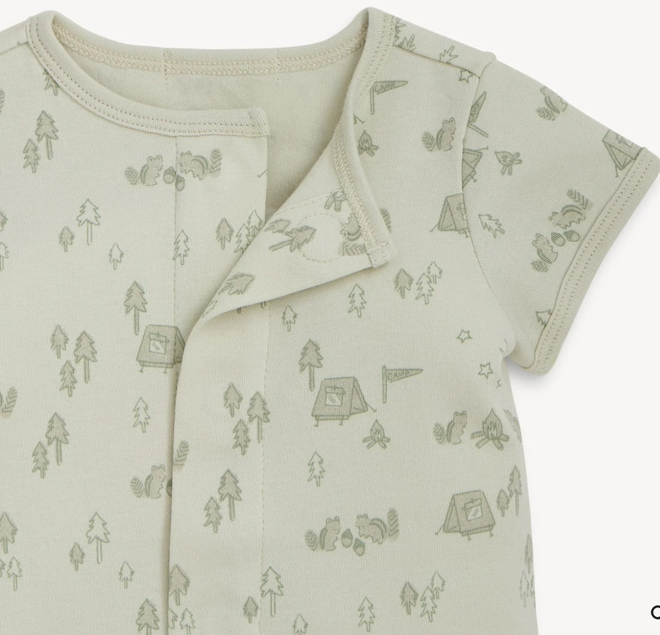 baby romper with camping pattern on a light background