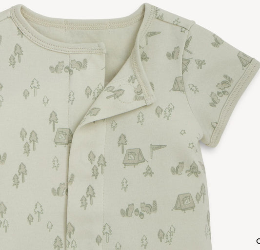 baby romper with camping pattern on a light background