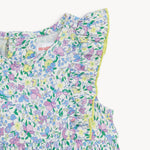 Floral-patterned baby romper ruffle sleeve on a white background