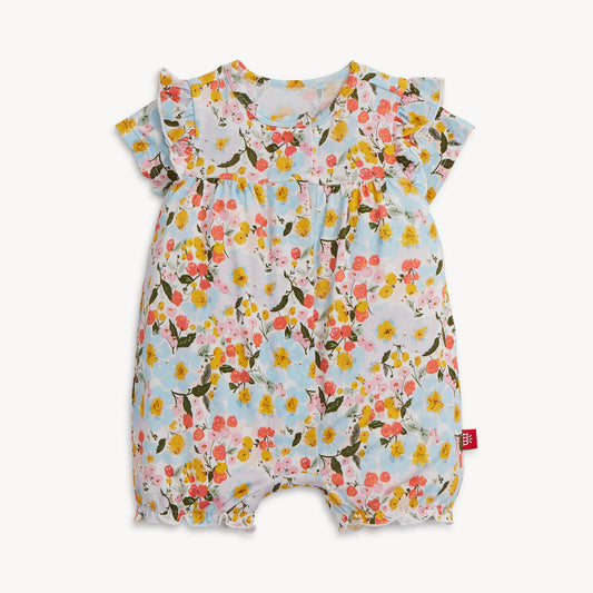 Floral baby romper on a white background