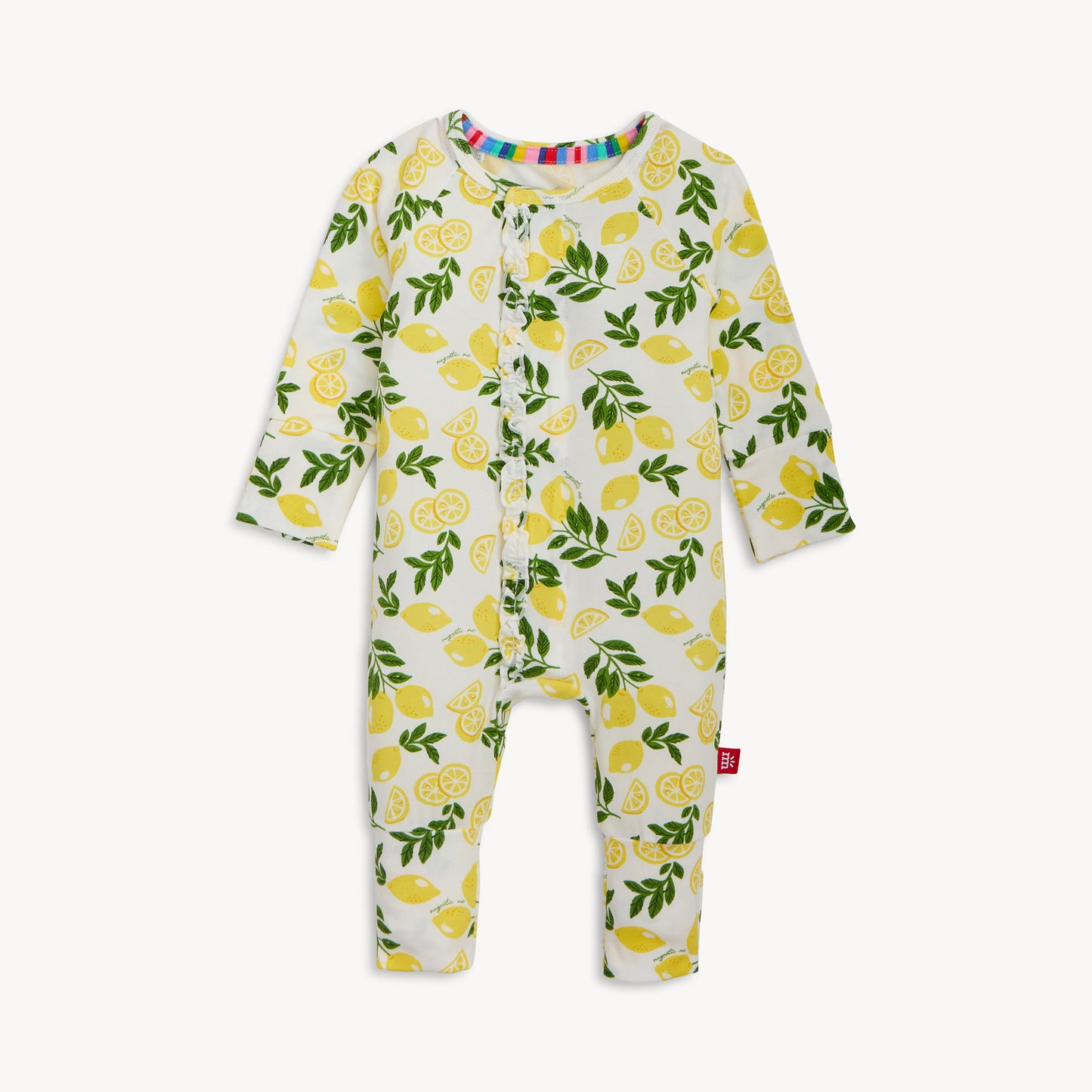 Baby coverall with lemon pattern on a white background
