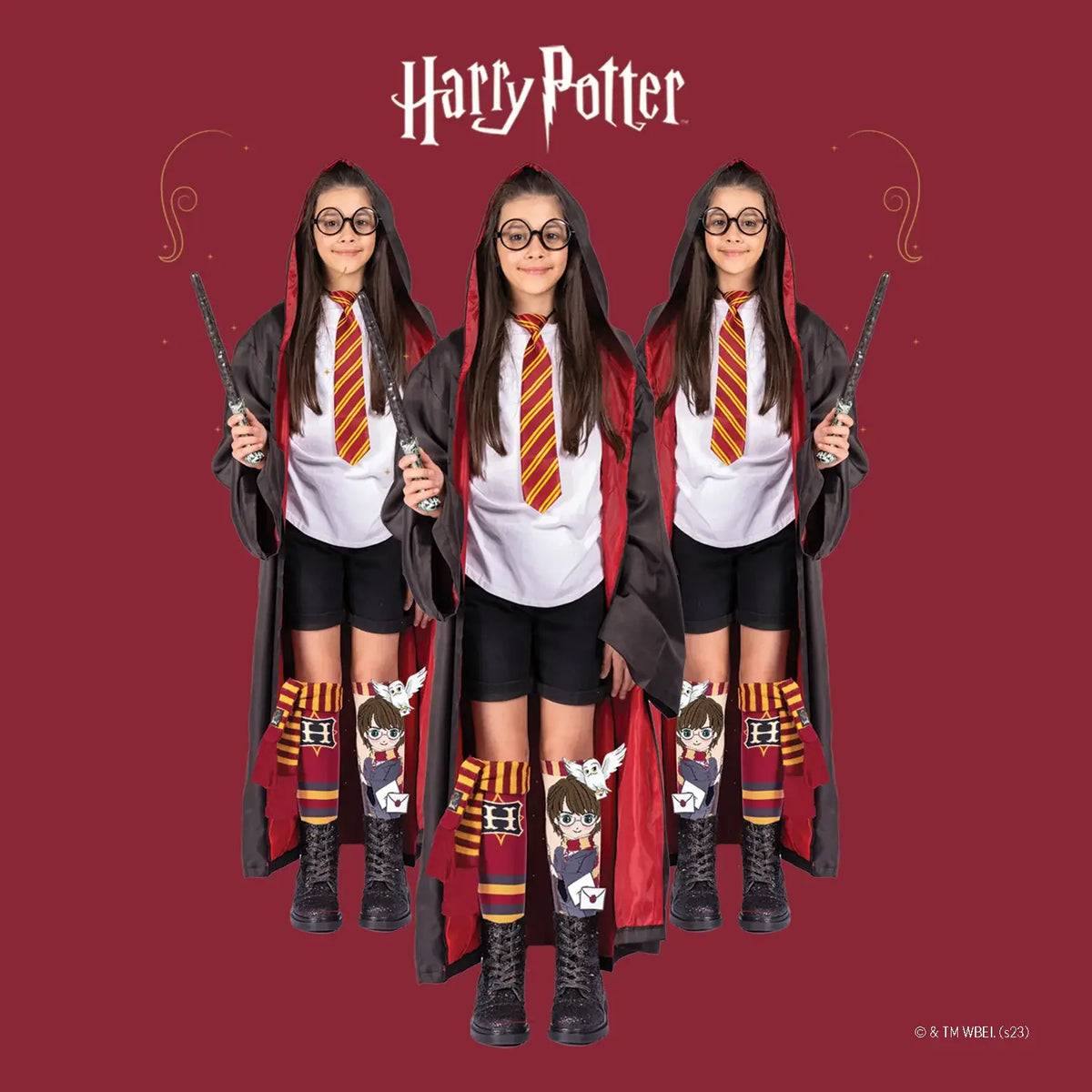 Person wearing a Harry Potter-themed outfit with robes, tie, and socks on a red background.