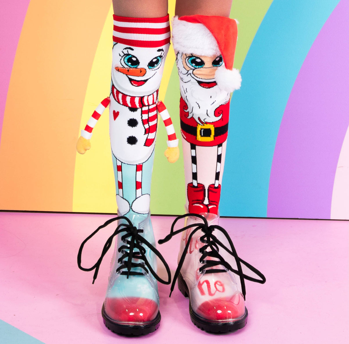 Colorful socks with cartoon characters on a multicolored background