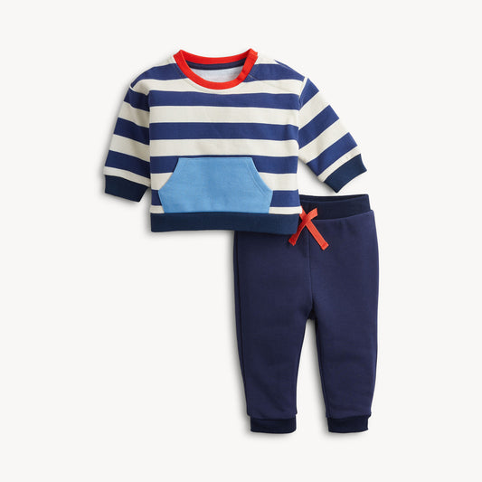Baby two-piece outfit set featuring a navy and white striped long-sleeve top with a light blue front pocket and red collar trim, paired with navy jogger pants and a red drawstring.