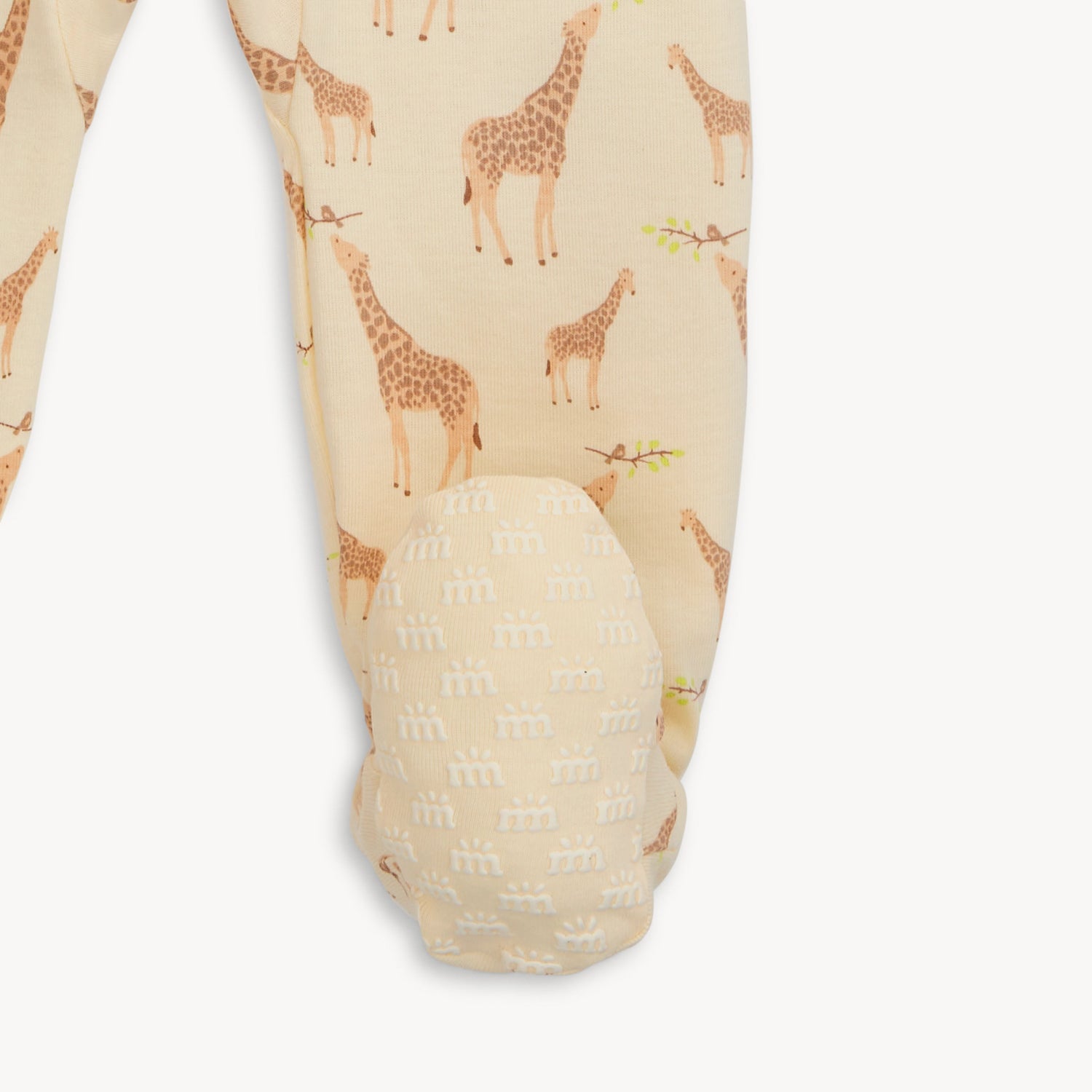 Baby leggings with giraffe pattern on a white background