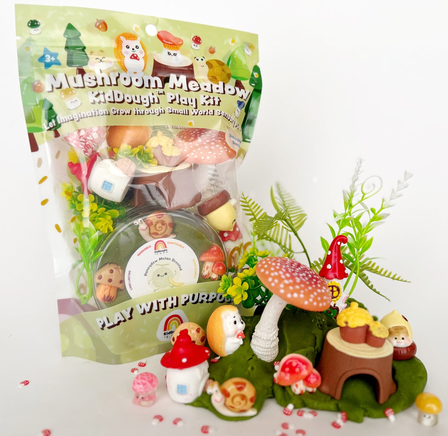 Mushroom Meadow play kit with figures and packaging on a white background