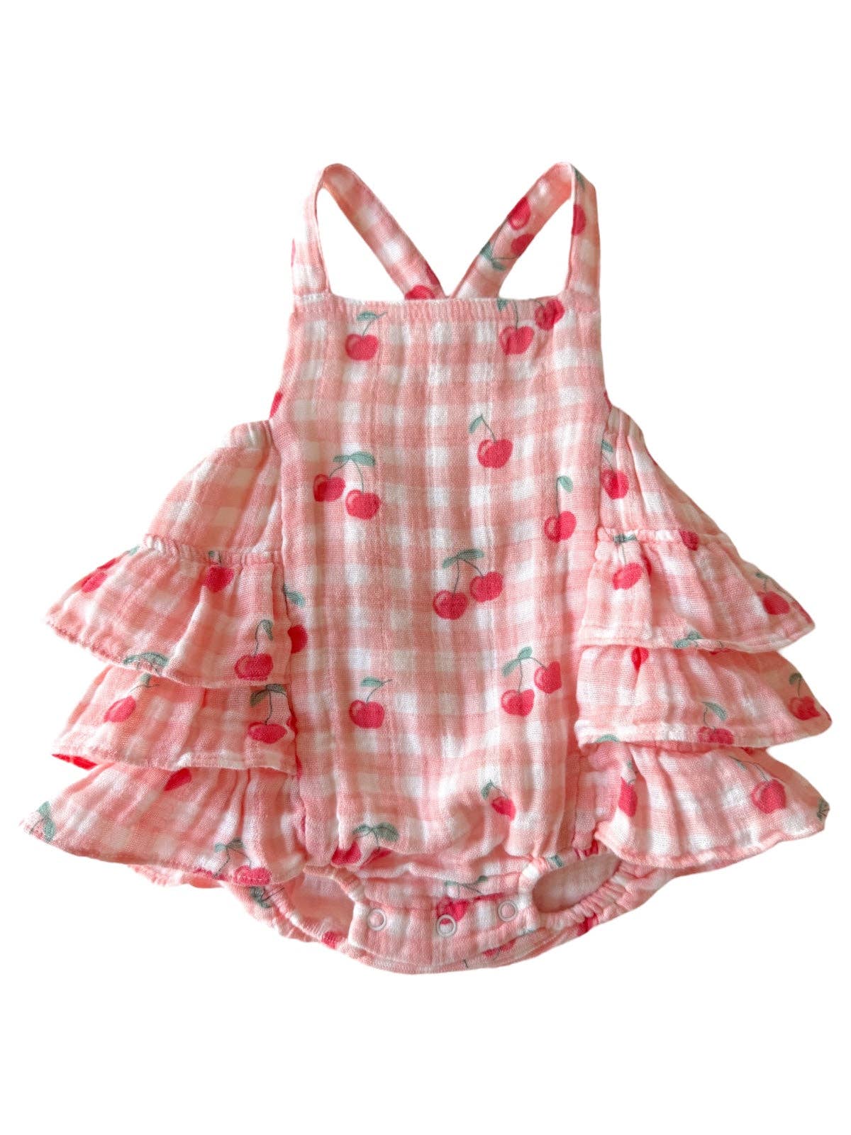 Pink checkered dress with cherry pattern on a white background
