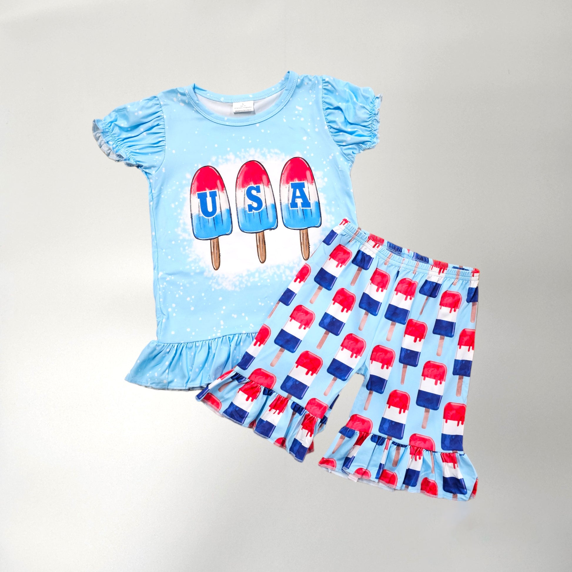 red, white, blue two piece shorts set . Popsicle print design