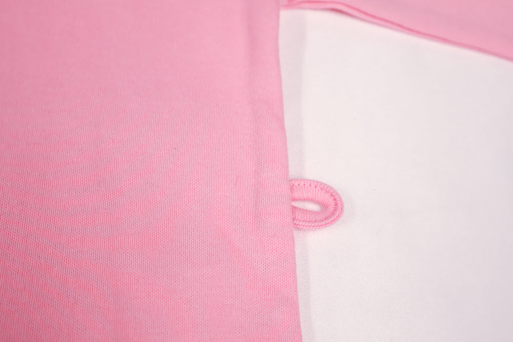 Pink long sleeve onsie pacifier loop
