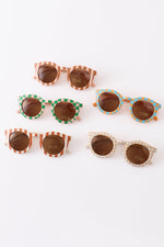 A collection of sunglasses with retro stripes and square patterns, displayed in different colors.