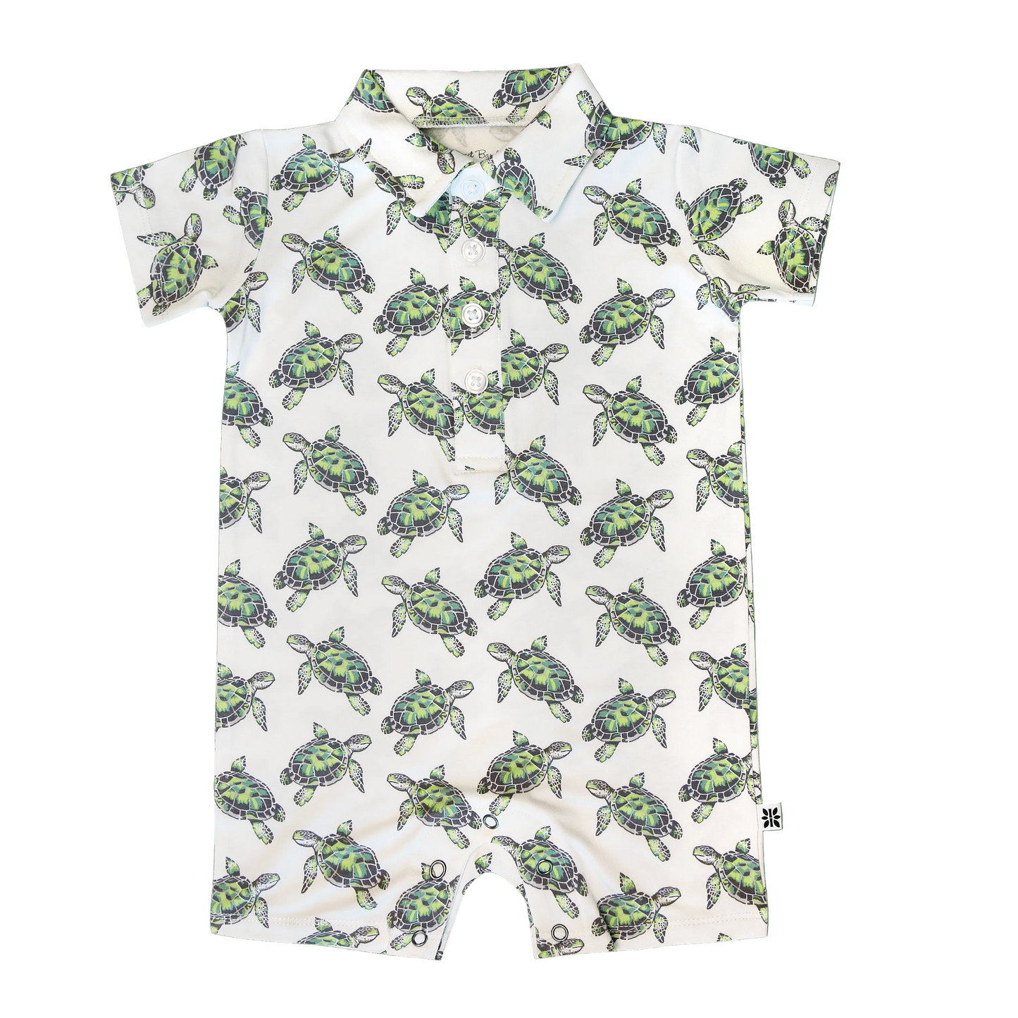 Short-sleeve polo romper with green turtle pattern on a white background