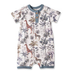 Baby romper with jungle animal print on a white background