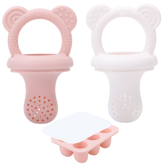 Two silicone baby self feeding pacifier, one pink and one white, on a white background.