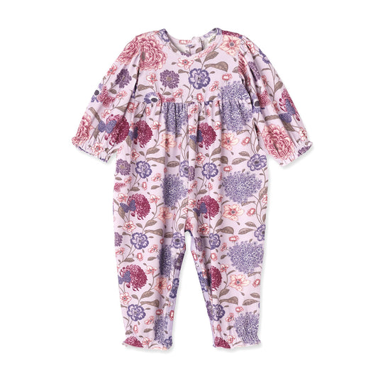 Floral patterned baby onesie on a white background