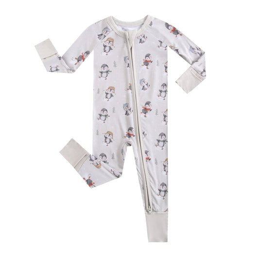 Baby onesie with a pattern of penguin cartoon characters on a white background