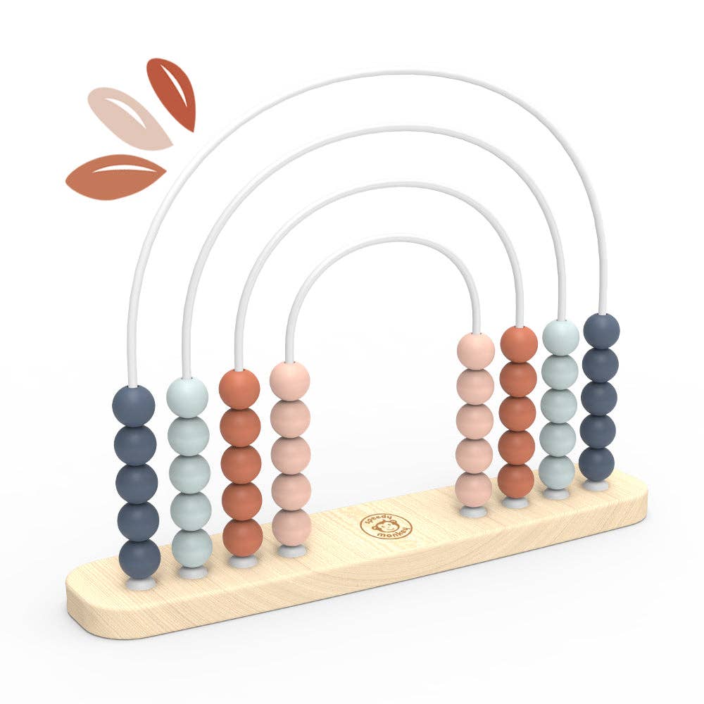 Colorful abacus toy with wooden base and gradient beads on a white background