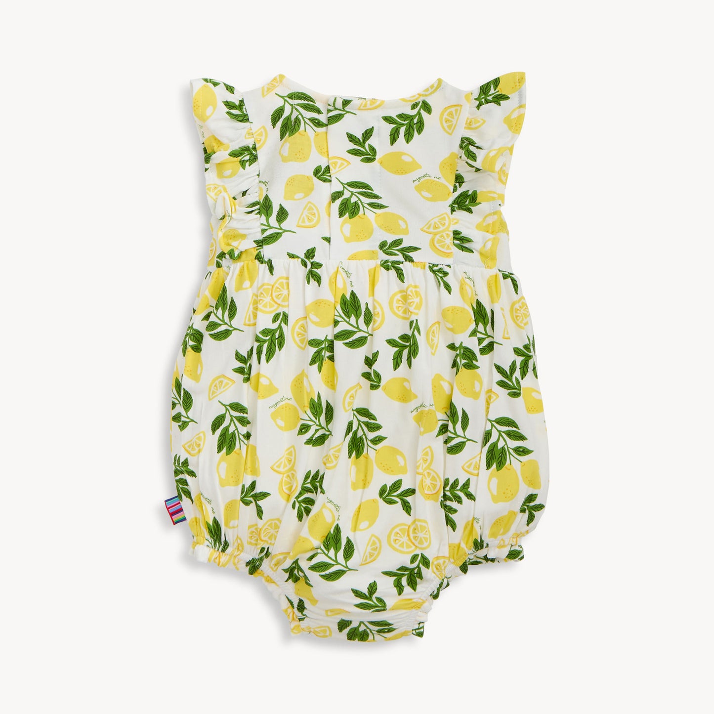 back of Baby romper with lemon and leaf pattern on a white background