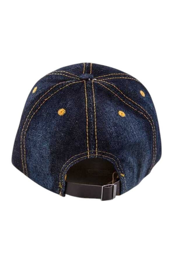 Blue denim cap with yellow stitching on a white background