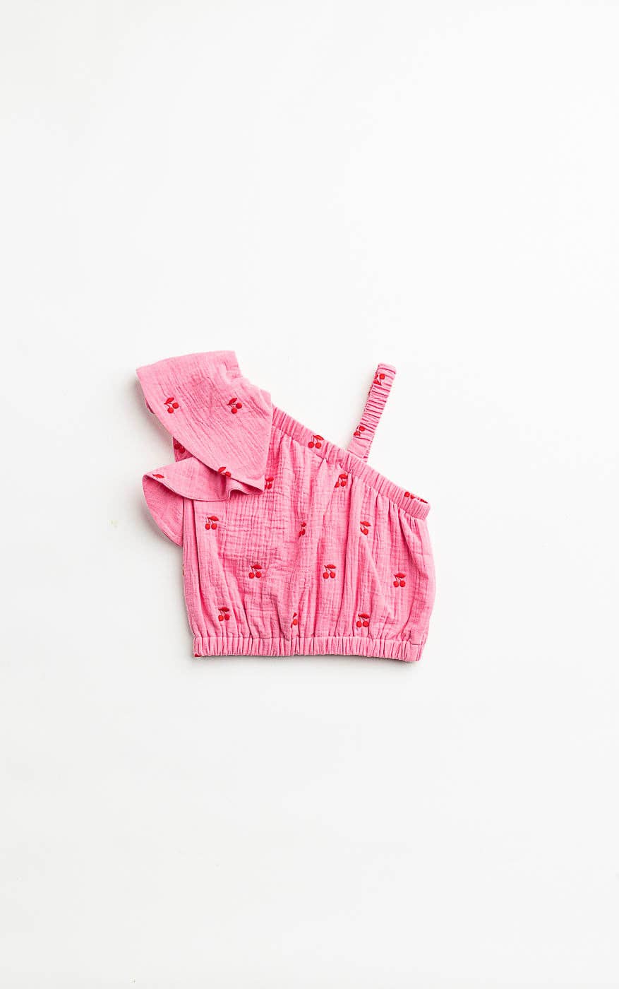 Back of girls Pink crop top with ruffled details on a white background