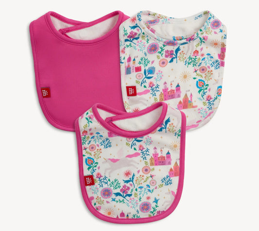 Three baby bibs with pink borders and castle-themed designs on a white background