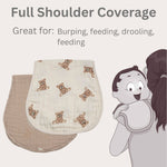 Two baby burp cloths with teddy bear pattern and a cartoon baby being held, on a light beige background.