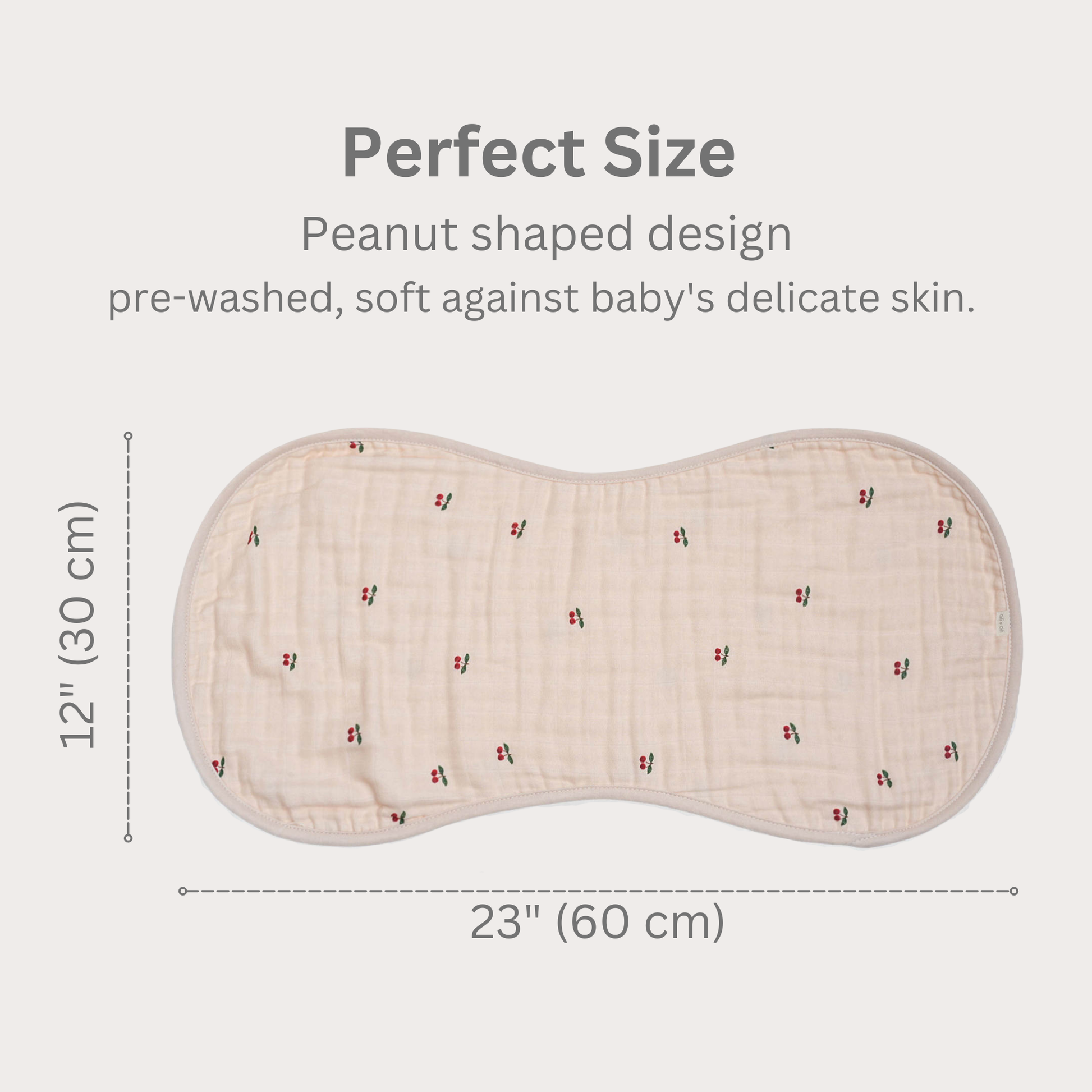 Peanut-shaped baby burp cloth with measurements and text on a white background