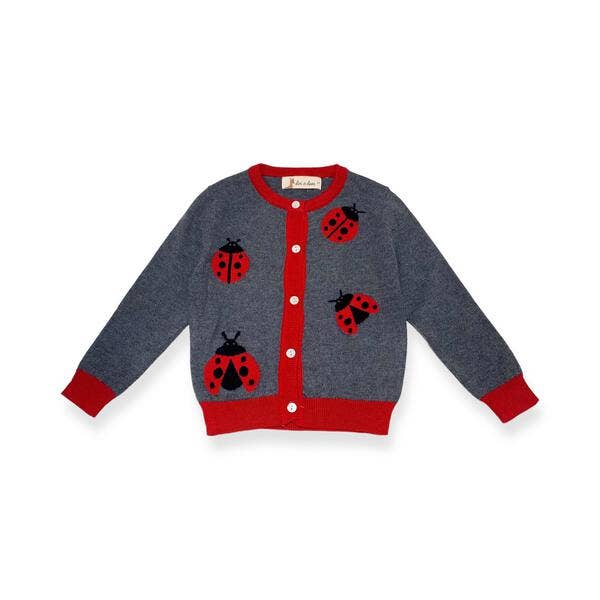 Children's cardigan with ladybug patterns on a white background