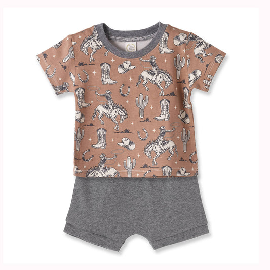 Children's outfit with cowboy-themed shirt and gray shorts on a white background