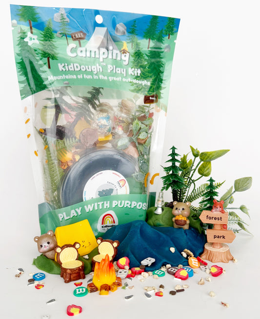 Camping-themed kid dough play kit with packaging and accessories on a white background