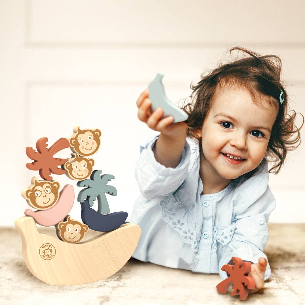 Child playing with a wooden toy set on a light background