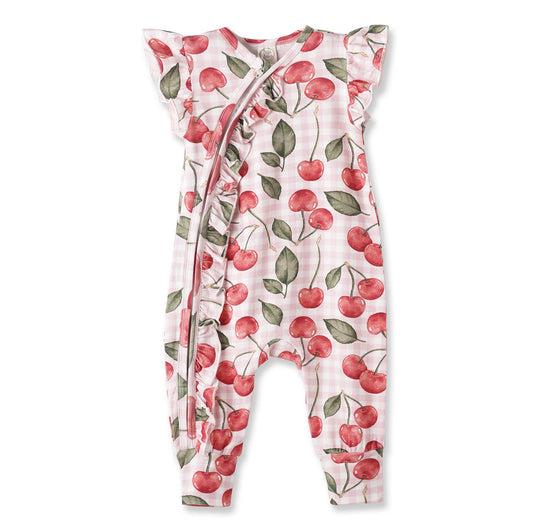 Baby romper with cherry pattern on a white background
