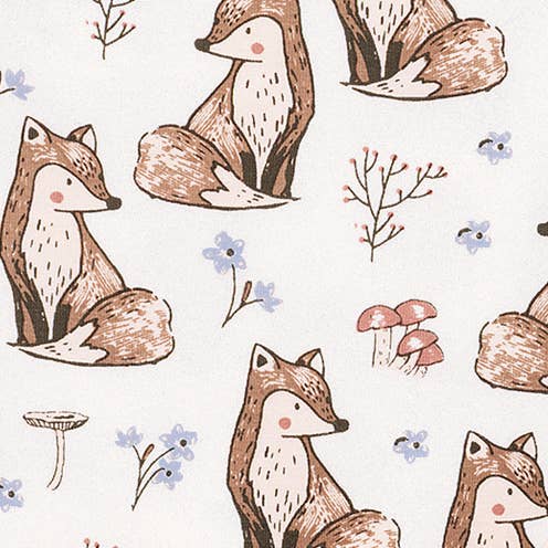Pattern of foxes, mushrooms, and flowers on a white background