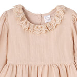 Beige dress with lace collar and 'Truffles Ruffles' label on a white background