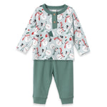 A set of children's Christmas clothing, featuring a long-sleeve henley top with a snowman pattern and green pants.