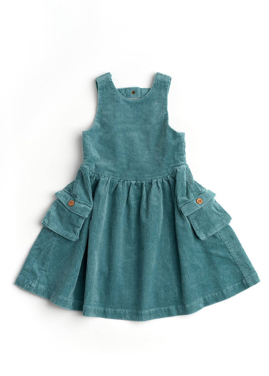 Teal corduroy dress with pockets on a white background