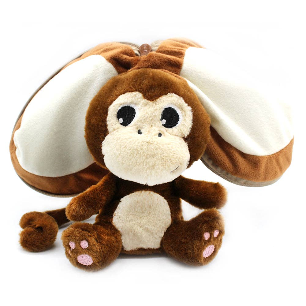Plush monkey toy with a coconut shell on a white background